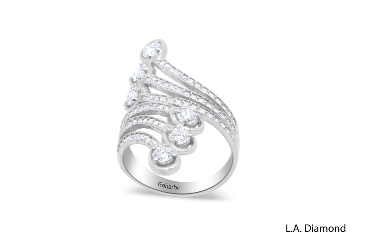 14K White Gold Twisted Ring with Round & Pear Diamonds (0.87 ct)