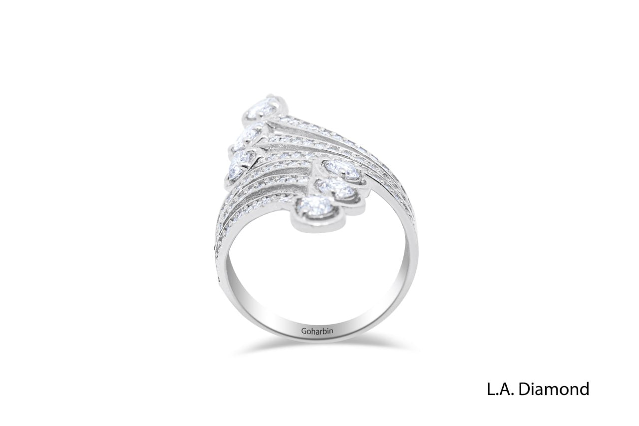 14K White Gold Twisted Ring with Round & Pear Diamonds (0.87 ct)