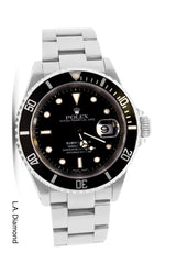 PRE-OWNED Rolex Submariner