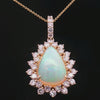 Elegant 14K Yellow Gold Opal & Diamond Pear Halo Pendant Necklace | 15.08 CT Opal, 5.30 CT Diamonds