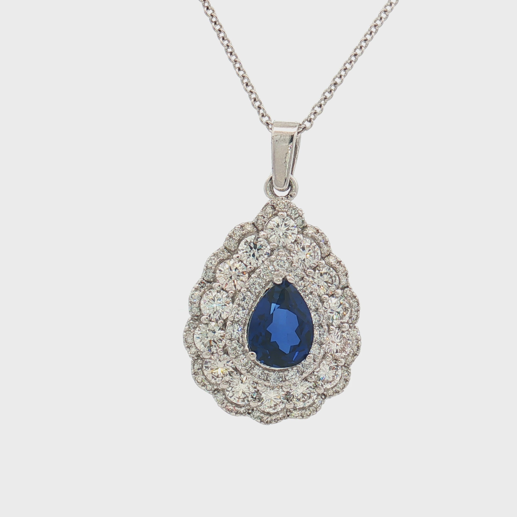 Pear Shape Blue Sapphire & Diamond Halo Pendant Necklace | Elegant Pear Drop Design