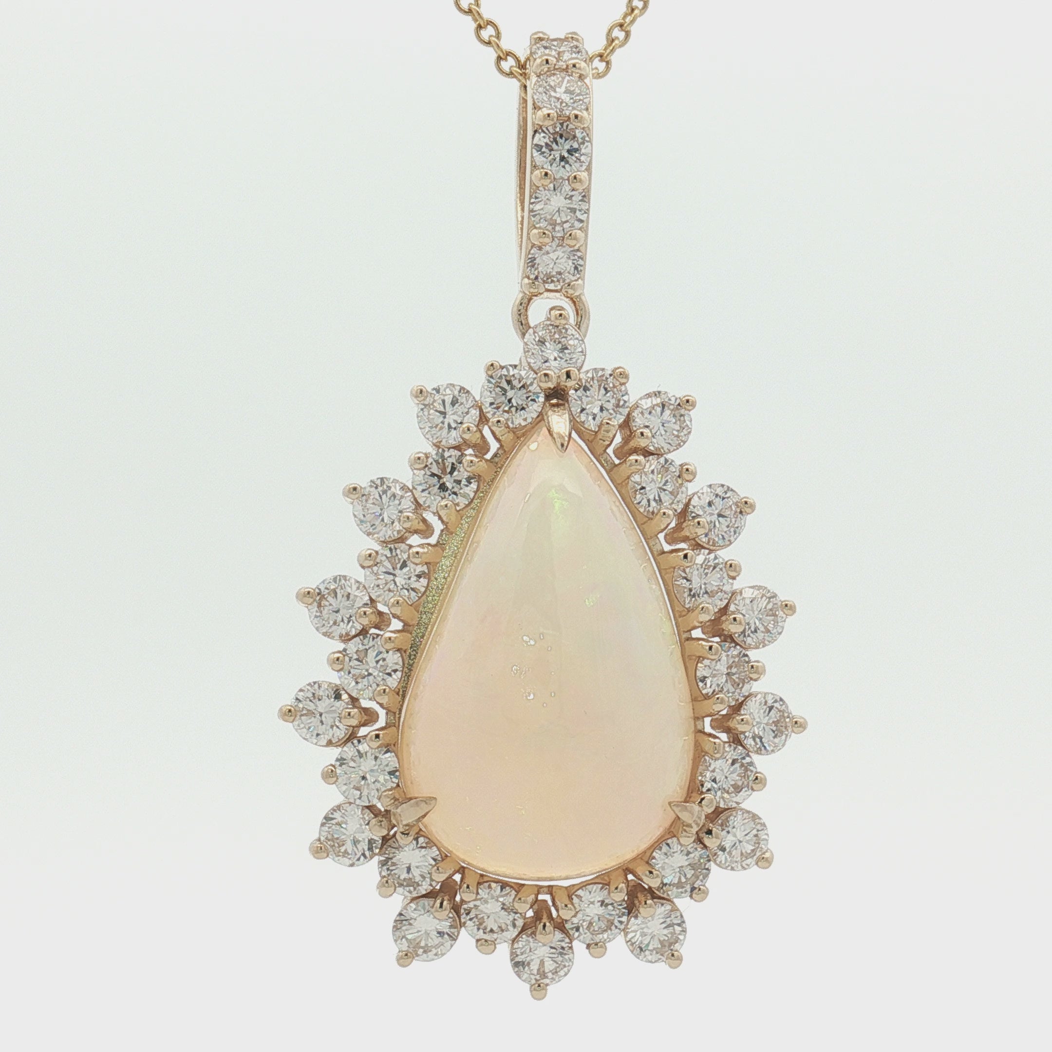 Elegant 14K Yellow Gold Opal & Diamond Pear Halo Pendant Necklace | 15.08 CT Opal, 5.30 CT Diamonds