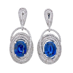 Oval-Shaped Blue Sapphire and 1/2 CT. T.W. Diamond Drop Earrings in 14K White Gold - LA DIAMOND